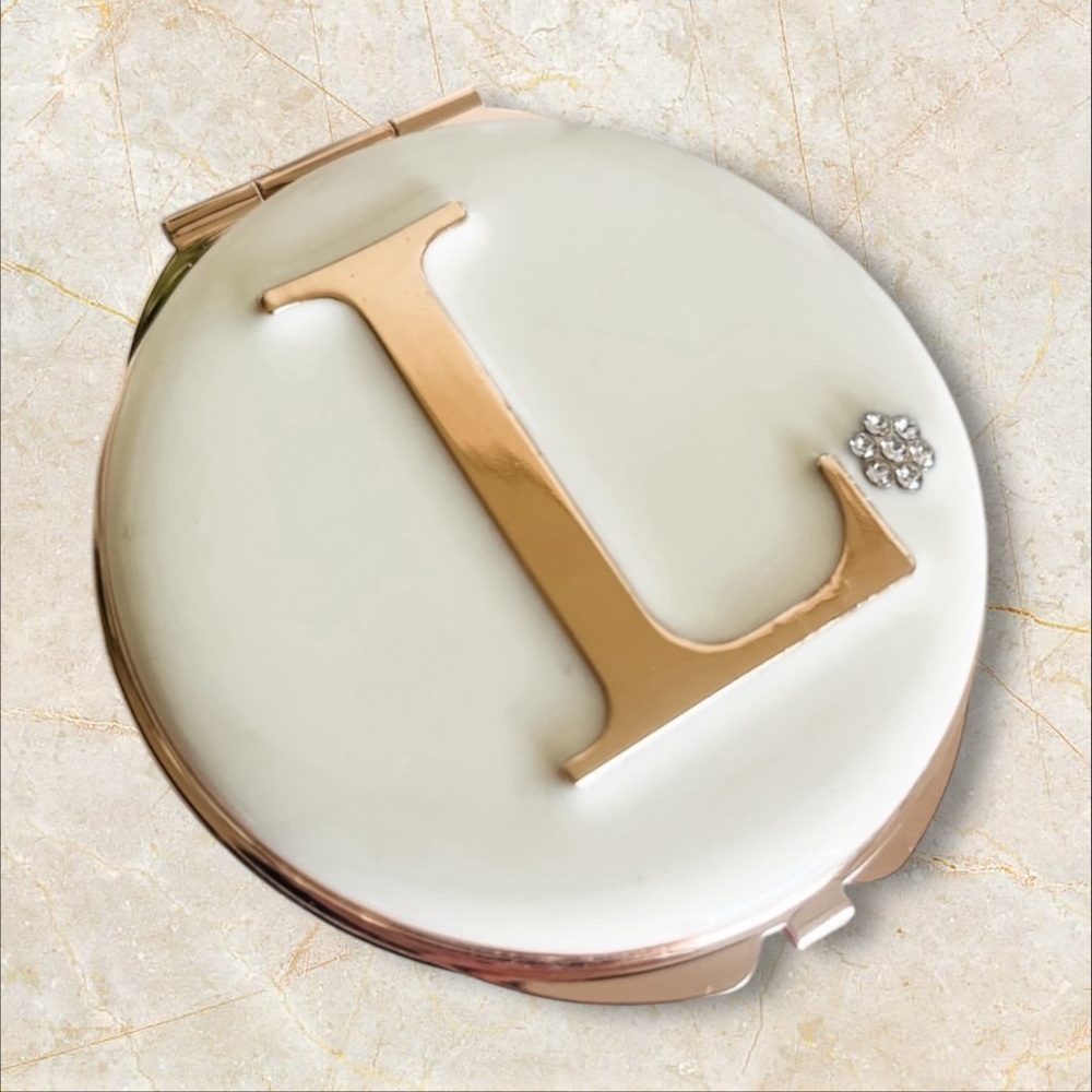 Monogrammed compact
